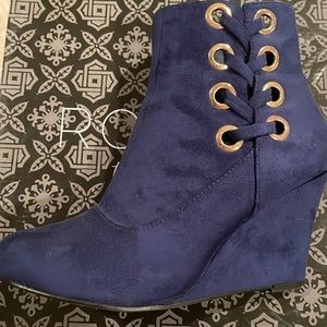 Midnight blue heeled boots